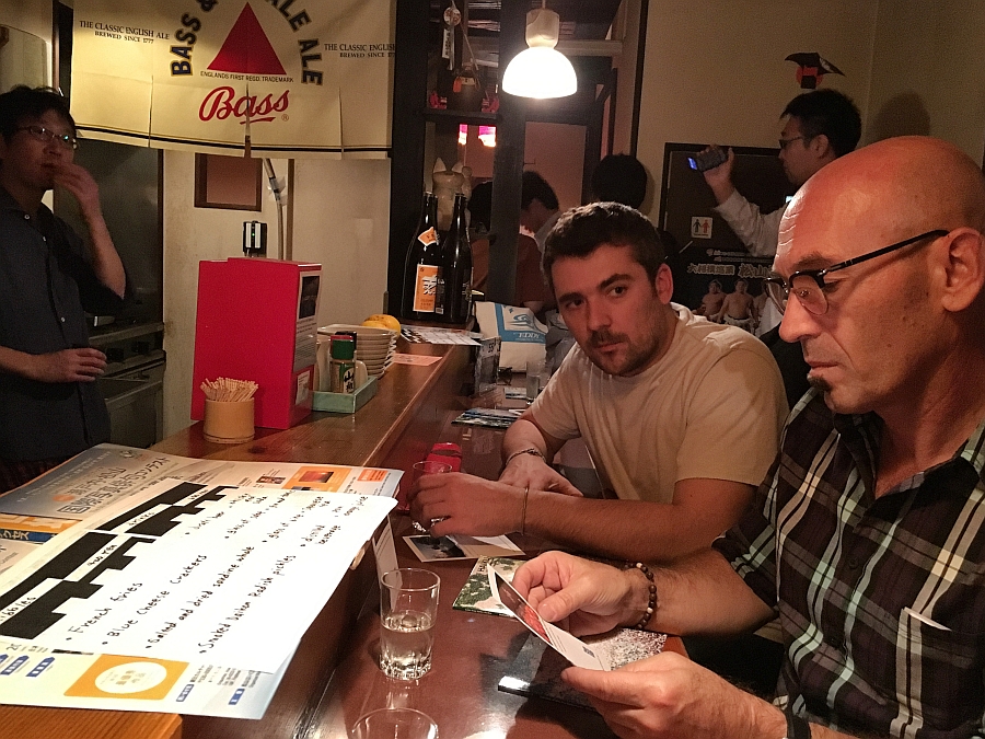 French visitors write poems at a haiku bar